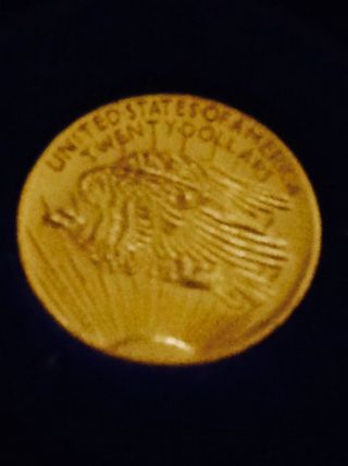 1/2gram Of Pure Gold Coin. photo