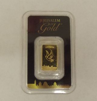 2.  5 Gram Holy Land Dove Of Peace Gold Bar (in Assay) photo
