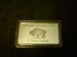 1 Troy Ounce Gold Buffalo Bar 100 Mills.  999 Fine Gold photo