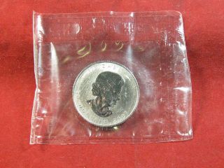 A 2007 Canadian Maple Leaf Fifty Dollar Palladium One Ounce Troy Coin photo