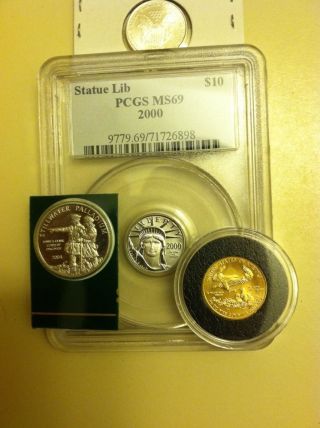 1/10 Palladium Buffalo.  1/10 Gold Eagle.  1/10 Platinum Ms69 Librty.  1/10 Silver photo