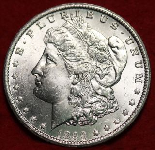 Uncirculated 1899 - O Silver Morgan Dollar S/h photo