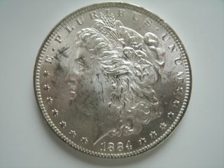 1884 O Morgan Silver Dollar - Uncirculated - Coin photo