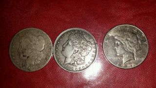 1878 - Cc1889 - O1922 - S,  Us Coin Silver Morgan Dollars photo