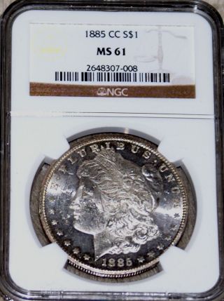 1885 Cc Morgan Dollar Coin Ngc Ms61 Ms 61 Slight Gold Rim Toning photo