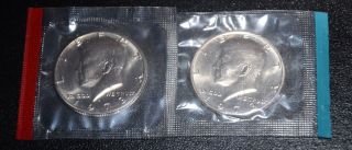 1973 P & D Uncirculated Kennedy Half Dollars In Cello photo