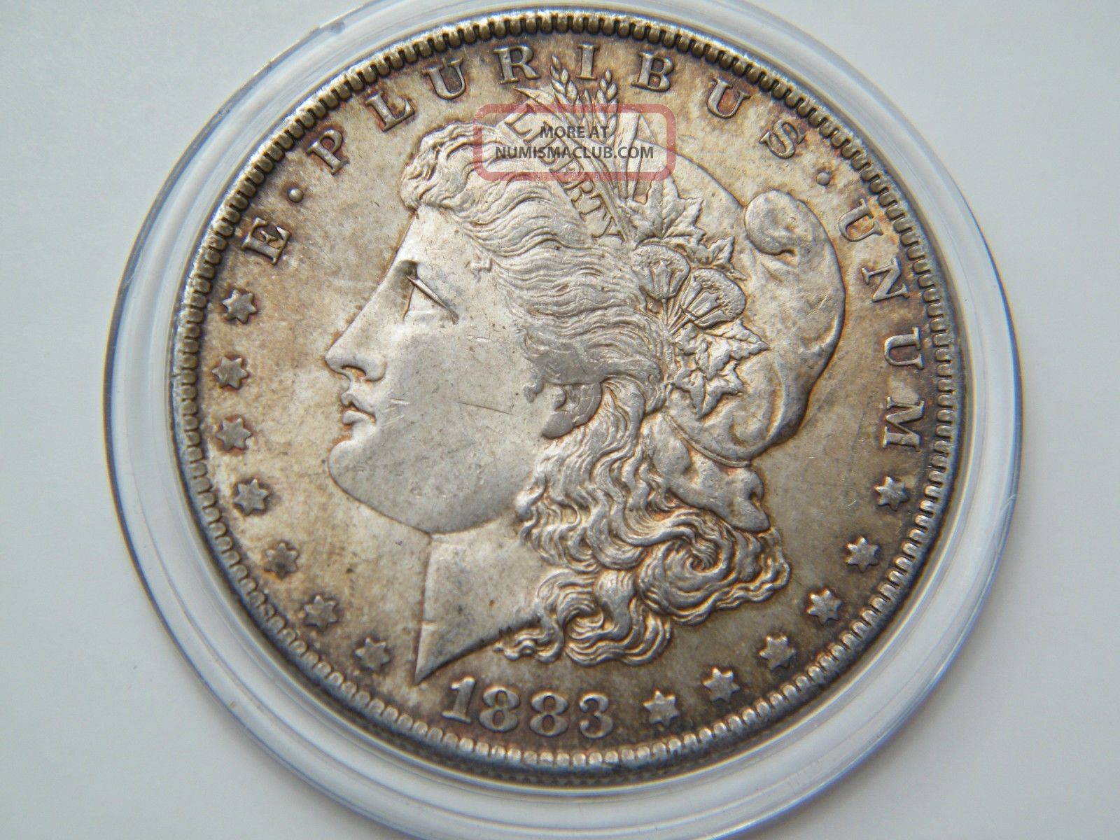 1883 - O Toned Morgan Silver Dollar