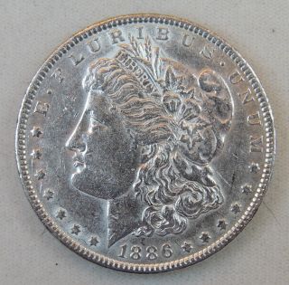 1886 - P $1 Morgan Silver Dollar - Au Details - Cleaned photo