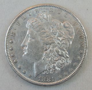 1881 - O $1 Morgan Silver Dollar - Strong Au Details - Cleaned photo