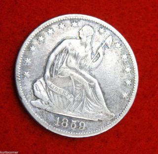 United States 1859 - O Seated Liberty Half Dollar With Very Good To Fine Details photo