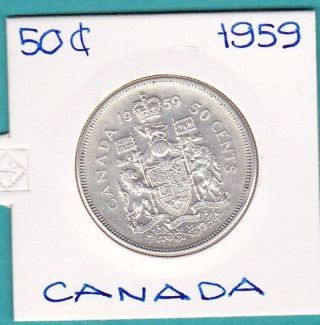 The Old Canada Silver Half Dollar 1959 Coin. photo