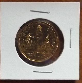 2005 Terry Fox Loonie,  Canada Dollar Coin,  Uncirculated. photo