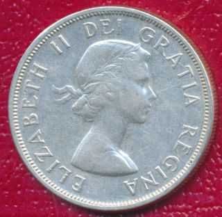 1958 Canada Silver Dollar - Totem Pole Reverse Silver Coin photo