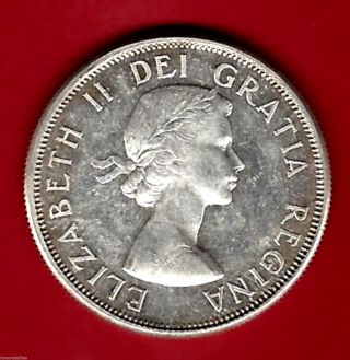 1963 Canada Fifty Cents,  Frosty And Toned.  Like,  Gradable, .  800 Fine Silver photo