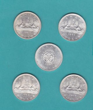 The Canada Five One Silver Dollars 1961 - 1965. photo