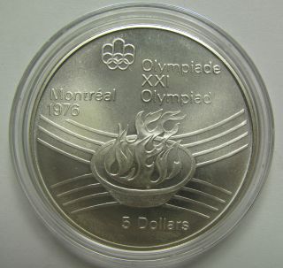 1976 $5 Bu Montreal Olympics Eternal Flame Clearance Canada.  925 Silver Five Dol photo