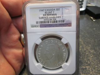 1947 Blunt 7 Canada Silver Dollar Ngc About Uncirculated photo
