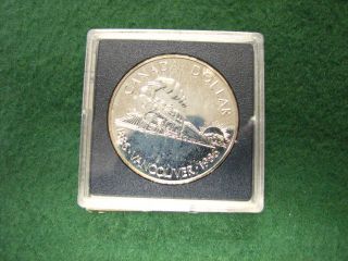 1986 Canada Silver Dollar Vancouver Train Silver Coin Brilliant Uncirculated photo