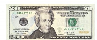 $20 Bill With Five 7 ' S In Serial Number photo