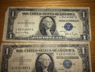 Four $1 One Dollar Silver Certificates Circulated/worn (1) 1935d,  (3) 1957 photo
