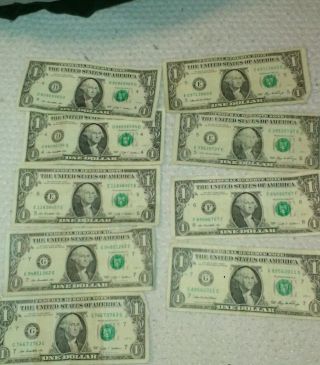 9 Dollar Bills Dif Locations Minted Matching Letter On Serial Number To. photo