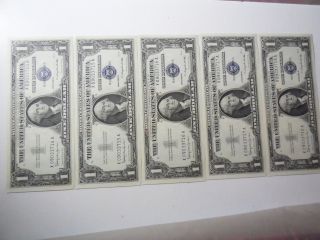 5 1957 B Sequential Uncirculated 1 Dollar Silver Certificate,  And Crisp photo