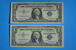 Two 1957 Consecutive & Uncirculated $1.  00 Silver Certificates photo