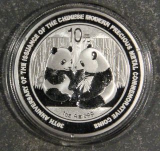 2009 1 T.  O.  999 Silver Chinese Panda 10 Yuan Coin Grade Bu B19 photo