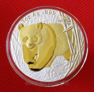 Rare 2002 Chinese Panda Gold & Silver Coin photo