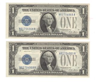 1928 - A $1 U.  S.  Funnyback Silver Certificate Note - Double Consecutive Unc photo