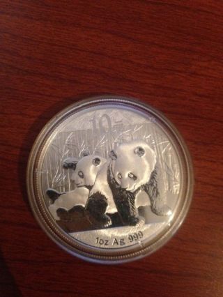 2010 1 Oz Chinese Silver Panda.  999 Pure Coin Brilliant Uncirculated photo