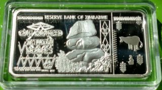 Zimbabwe $100 Trillion Dollars Silver / Brass Art Bar photo
