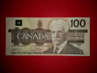 $100 Bank Note Canada 1988 Prefix Aju7730548 One Hundred Dollar Bill photo