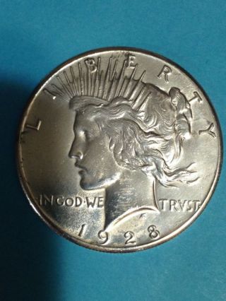 1928 Silver Peace Dollar Looks Unc.  Priced For Fast photo