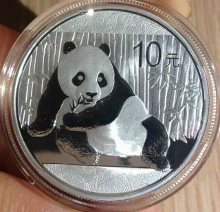 10 Yuan Face Value Of One Ounce Of Silver Panda Coin 2015 Panda Coin (2520508574 photo
