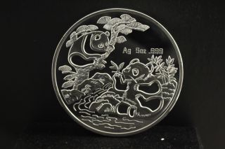 Chinese 1994 5oz Silver Chinese Panda Coin 1994 A8 photo