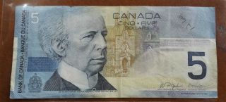 $5 Dollar Bill,  Canada,  Serial Hov5281038,  Circulated. photo