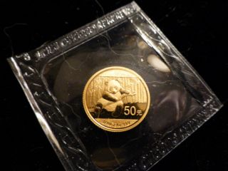 2014 1/10 Oz.  Gold (au).  999 50 Yuan China Panda Coin,  Wrapped photo