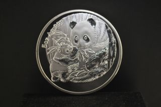 Chinese 2005 5oz Silver Chinese Panda Coin photo