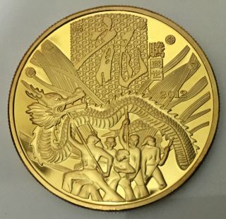 1 Oz Happy Lunar Year Lion Dance Finished In 24k Gold Clad Coin photo