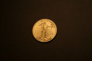 2014 American Gold Eagle 1/2 Oz.  $25 Coin In Gem Bu photo