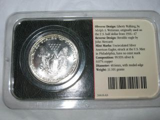 1987 Uncirculated Littleton Coin 99.  93 Silver American Eagle Dollar photo