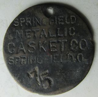 Ohio,  Springfield,  Metallic Casket Co.  Brass Check Token photo