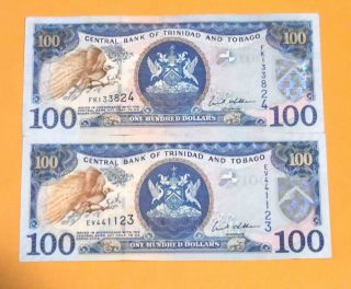 Two 2006 Trinidad And Tobago Unc 100 Dollar Bills photo