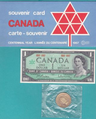 The Canada One Dollar Banknote 1967.  Date & Token 1967 & Stamps Card 1. photo
