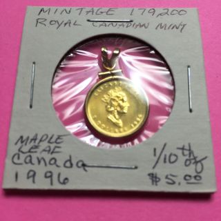 1/10 Oz $5.  00.  999 Canadian Gold Maple Leaf Coin In 14 Kt Gold Bezel, photo