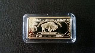 5 Gram 100 Mills.  999 Gold Buffalo Bar Gold Clad Best Deal On Ebay photo
