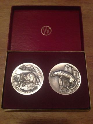 Wolverine & Puma.  1,  Oz Each Longines Sterling Silver Medal Coin photo
