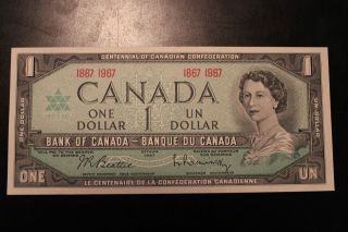 Canada 1967 $1 Bill With Date.  The Bill Is,  Crisp & Uncirculated photo