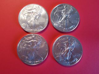 4 Brilliant Uncirculated 1 Oz Silver Eagles.  999 Fine Silver 2013,  14,  15,  16 photo